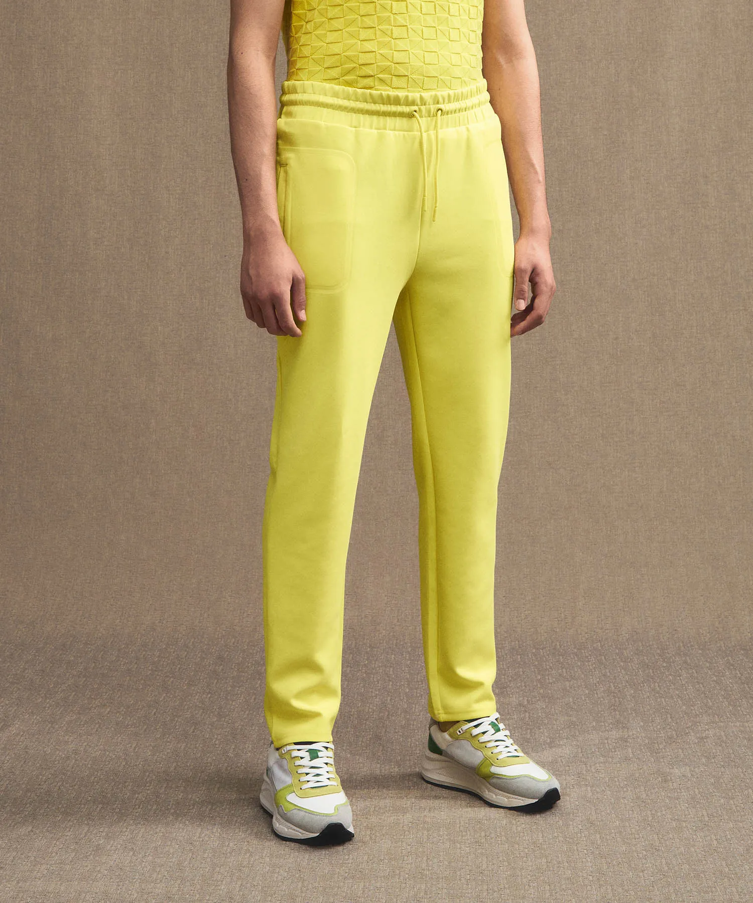 Pantaloni joggers in cotone stretch con nastrature